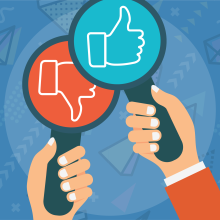 Icon showing two hands holding signs: one thumbs up, one thumbs down